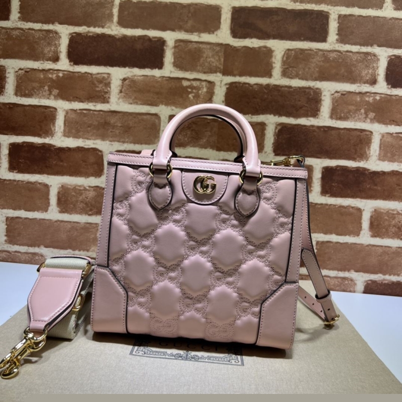 G*u*i shopping bags